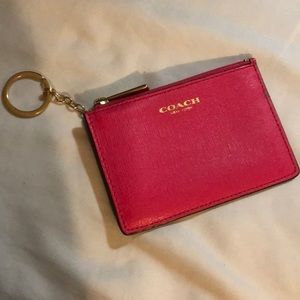 Pink coach ID/card holder with a zipper pocket